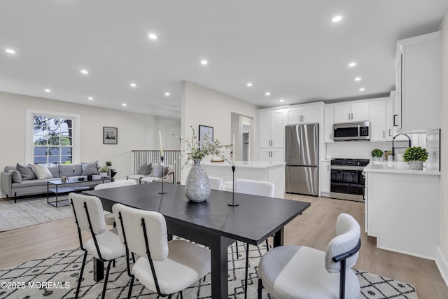 1117 Wake Forest Dr, Toms River, NJ 08753 - dining area featuring light wood-style floors and recessed lighting