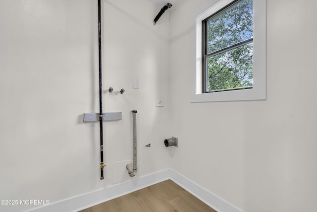 1117 Wake Forest Dr, Toms River, NJ 08753 - washroom with baseboards, hookup for a washing machine, wood finished floors, electric dryer hookup, and hookup for a gas dryer