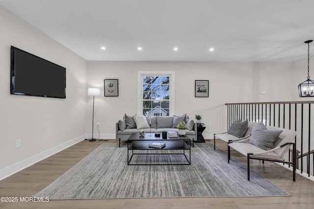 1117 Wake Forest Dr, Toms River, NJ 08753 - living area with a chandelier, wood finished floors, recessed lighting, and baseboards