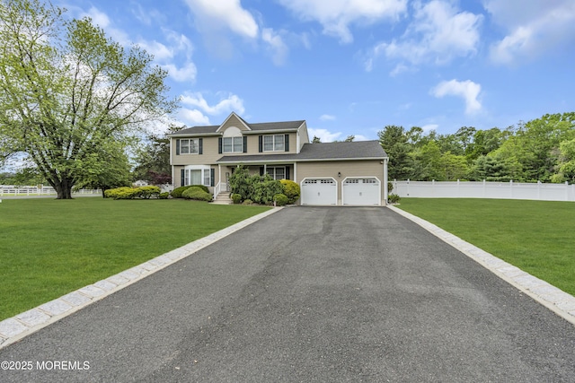 1 River Dr, Farmingdale, NJ 07727 - view of front facade with a garage, driveway, and a porch