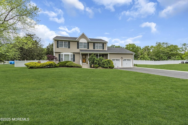 1 River Dr, Farmingdale, NJ 07727 - view of front of house featuring a garage and asphalt driveway