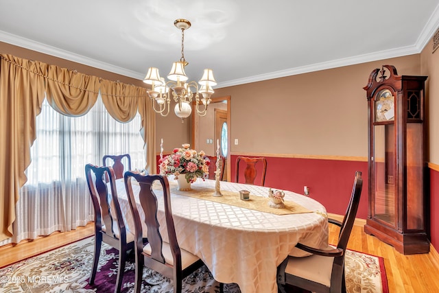 1 River Dr, Farmingdale, NJ 07727 - dining room with a chandelier, ornamental molding, light wood-style flooring, and baseboards
