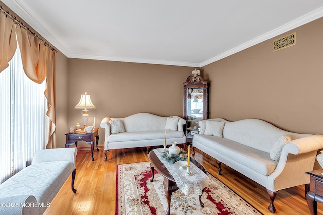 1 River Dr, Farmingdale, NJ 07727 - living room featuring ornamental molding, light wood-style floors, and baseboards