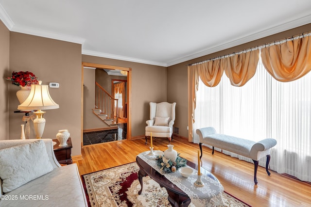 1 River Dr, Farmingdale, NJ 07727 - living room with stairs, crown molding, wood finished floors, and baseboards