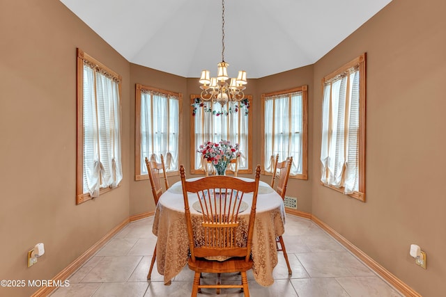 1 River Dr, Farmingdale, NJ 07727 - dining room with a chandelier, vaulted ceiling, baseboards, and light tile patterned floors