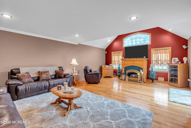 1 River Dr, Farmingdale, NJ 07727 - living room featuring wood finished floors, vaulted ceiling, recessed lighting, a fireplace, and baseboards
