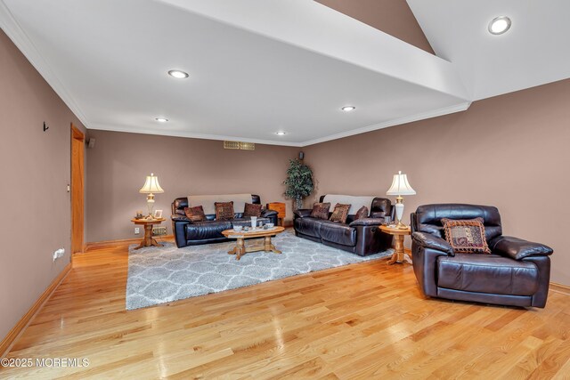 1 River Dr, Farmingdale, NJ 07727 - living room featuring recessed lighting, ornamental molding, wood finished floors, baseboards, and vaulted ceiling
