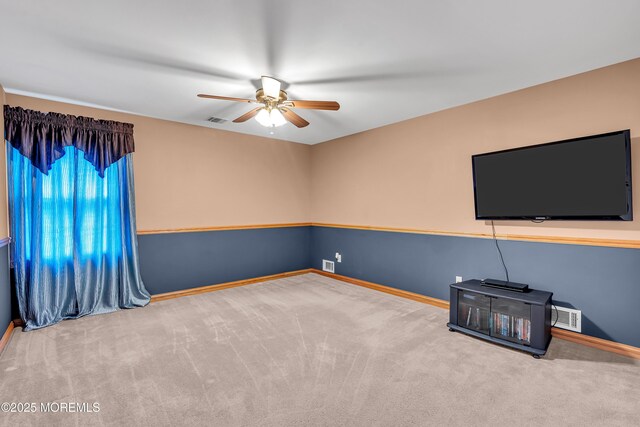 1 River Dr, Farmingdale, NJ 07727 - unfurnished living room featuring carpet, a ceiling fan, and baseboards