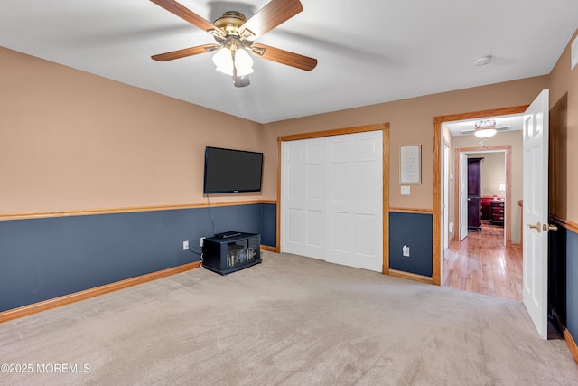 1 River Dr, Farmingdale, NJ 07727 - unfurnished bedroom with carpet flooring, a closet, a ceiling fan, and baseboards