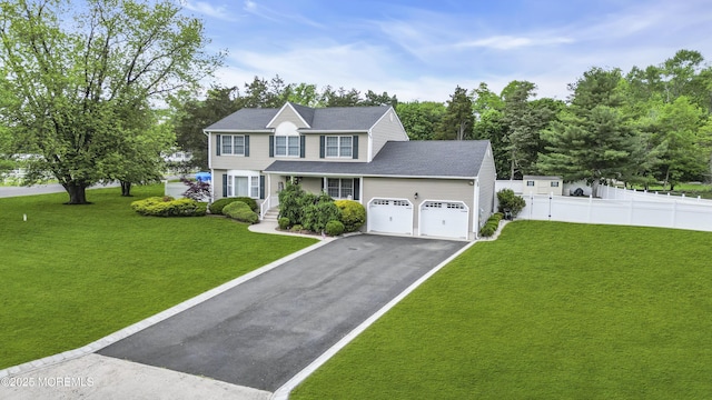 1 River Dr, Farmingdale, NJ 07727 - view of front of house featuring asphalt driveway and an attached garage