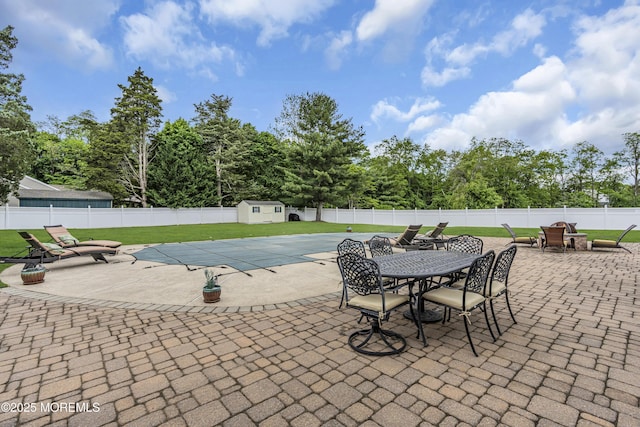 1 River Dr, Farmingdale, NJ 07727 - view of swimming pool featuring a patio and outdoor dining area