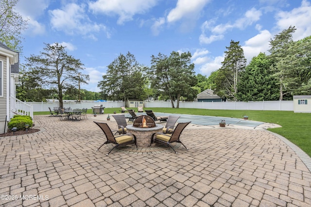 1 River Dr, Farmingdale, NJ 07727 - view of patio / terrace featuring an outdoor fire pit