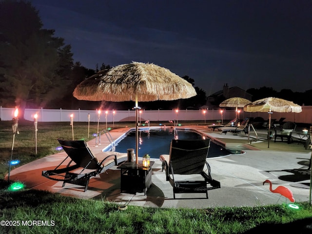 1 River Dr, Farmingdale, NJ 07727 - patio at twilight with an outdoor fire pit and a patio area