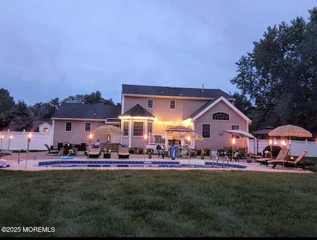 1 River Dr, Farmingdale, NJ 07727 - back of property featuring a deck and a patio area