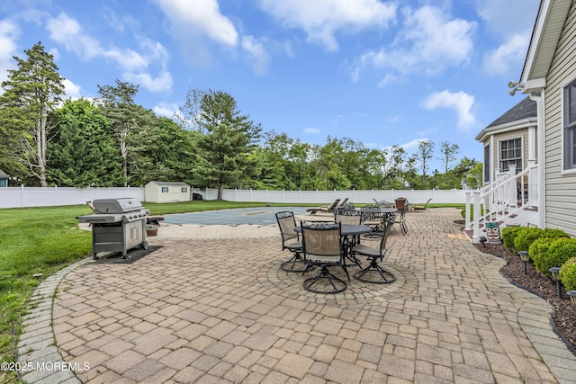 1 River Dr, Farmingdale, NJ 07727 - view of patio featuring area for grilling and outdoor dining area