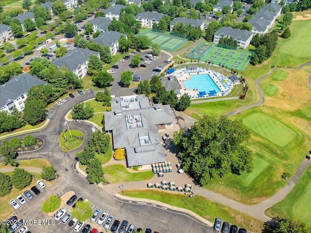 634 Saint Andrews Pl, Manalapan, NJ 07726 - drone / aerial view of a pool and a local golf course