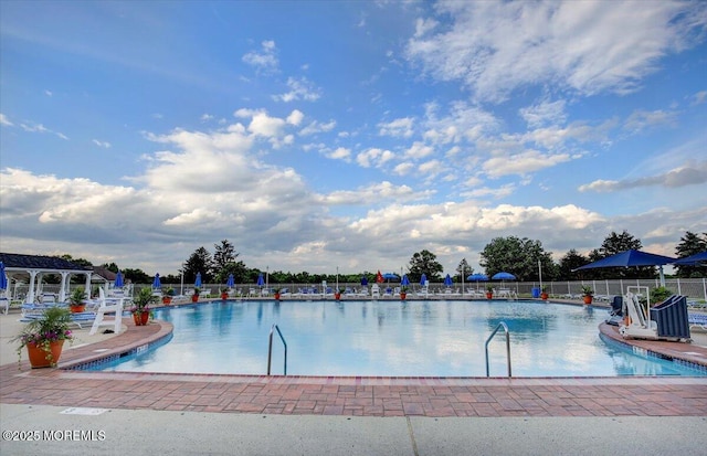 634 Saint Andrews Pl, Manalapan, NJ 07726 - community pool with a patio area