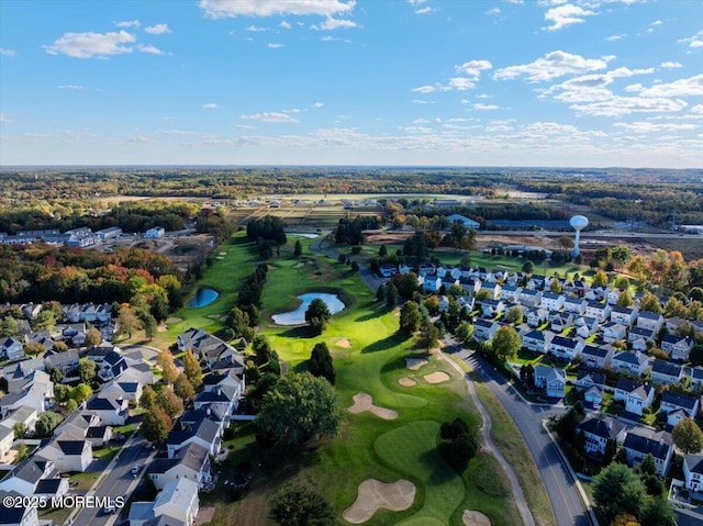 634 Saint Andrews Pl, Manalapan, NJ 07726 - aerial overview of property's location with a golf club, nearby suburban area, and a nearby body of water