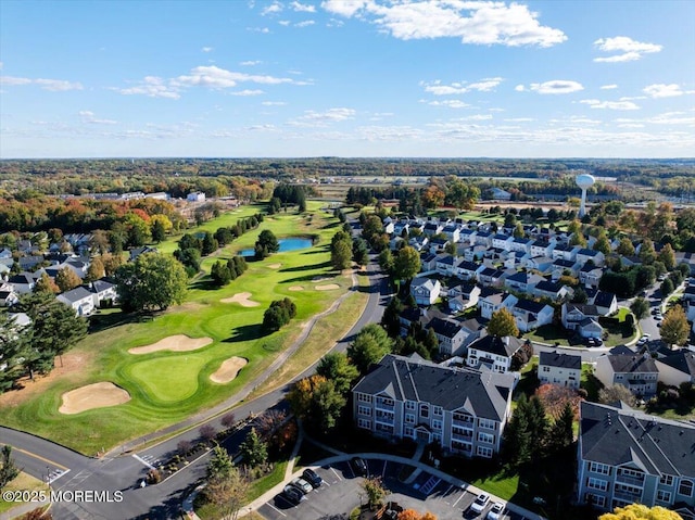 634 Saint Andrews Pl, Manalapan, NJ 07726 - aerial perspective of suburban area with a local golf course and a nearby body of water