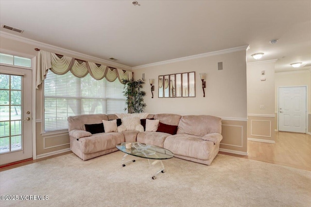 634 Saint Andrews Pl, Manalapan, NJ 07726 - carpeted living area featuring ornamental molding and wainscoting