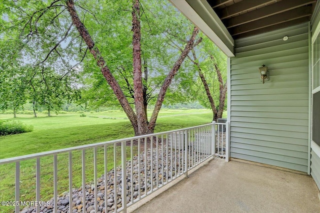634 Saint Andrews Pl, Manalapan, NJ 07726 - balcony featuring view of wooded area