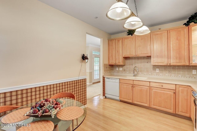 634 Saint Andrews Pl, Manalapan, NJ 07726 - kitchen with dishwasher, light brown cabinetry, a sink, light wood-style floors, and light countertops
