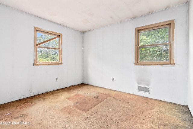 1233 Herkimer Rd, Brick, NJ 08724 - unfurnished room featuring healthy amount of natural light and carpet