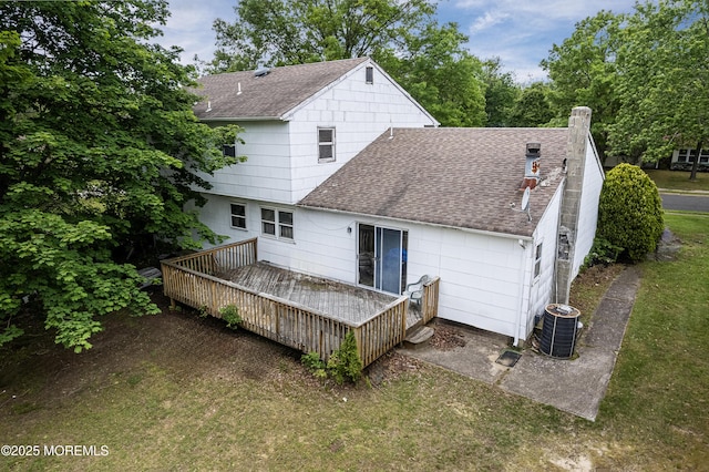 1233 Herkimer Rd, Brick, NJ 08724 - back of property with roof with shingles, a wooden deck, a lawn, and a chimney