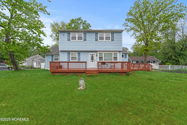 30 Woodland Dr, Howell, NJ 07731 - back of property with a wooden deck