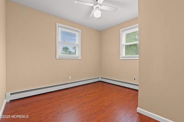 30 Woodland Dr, Howell, NJ 07731 - empty room with wood finished floors, a ceiling fan, and baseboards