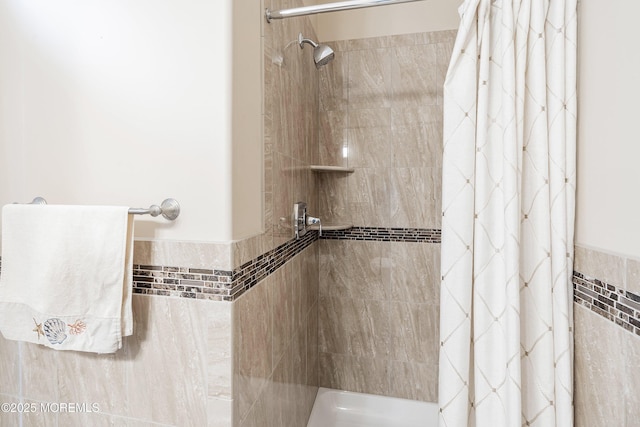 22 Corrigan Ave, Pine Beach, NJ 08741 - full bathroom featuring tiled shower and a wainscoted wall