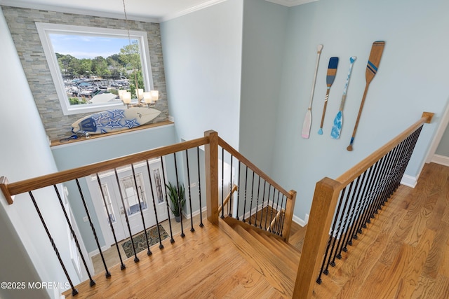 22 Corrigan Ave, Pine Beach, NJ 08741 - stairway with wood finished floors, crown molding, and baseboards