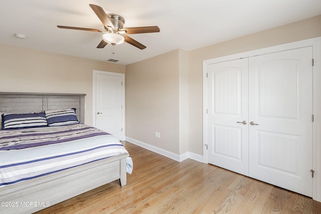 22 Corrigan Ave, Pine Beach, NJ 08741 - bedroom featuring baseboards, light wood-type flooring, a closet, and a ceiling fan