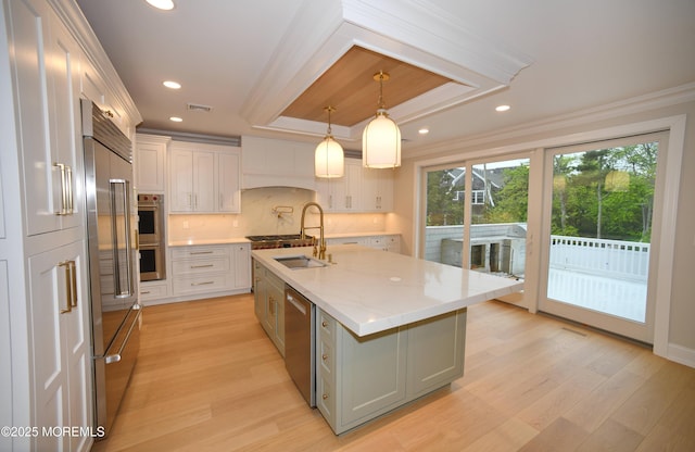674 Lake Ave, Bay Head, NJ 08742 - kitchen featuring appliances with stainless steel finishes, light wood-type flooring, crown molding, a tray ceiling, and backsplash