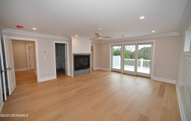 674 Lake Ave, Bay Head, NJ 08742 - unfurnished living room featuring a glass covered fireplace, ornamental molding, a ceiling fan, light wood-style flooring, and baseboards