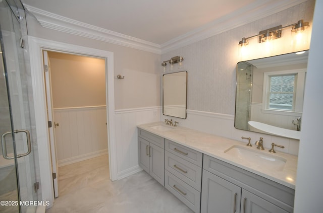 674 Lake Ave, Bay Head, NJ 08742 - bathroom featuring a shower stall, double vanity, ornamental molding, and wainscoting