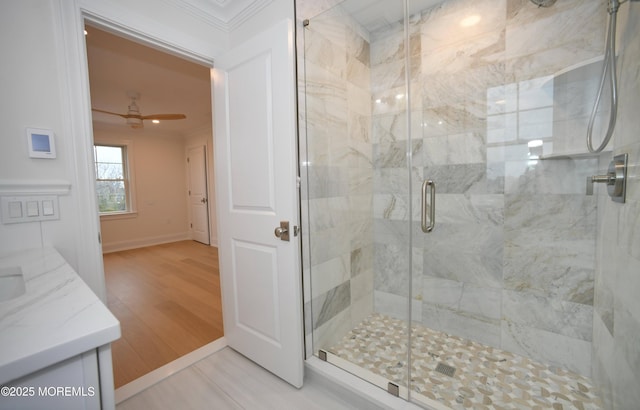 674 Lake Ave, Bay Head, NJ 08742 - bathroom featuring crown molding, a stall shower, vanity, and baseboards