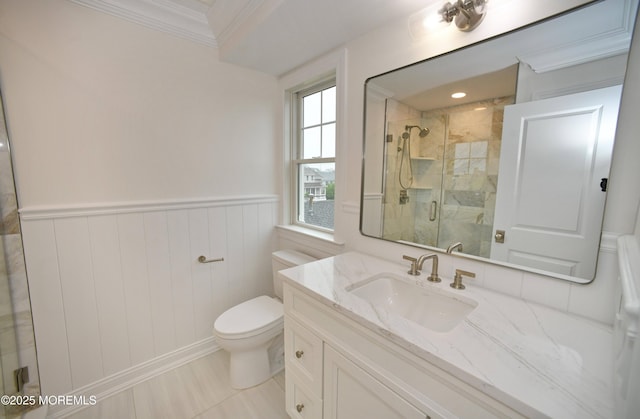 674 Lake Ave, Bay Head, NJ 08742 - bathroom featuring a shower stall, vanity, toilet, a wainscoted wall, and crown molding