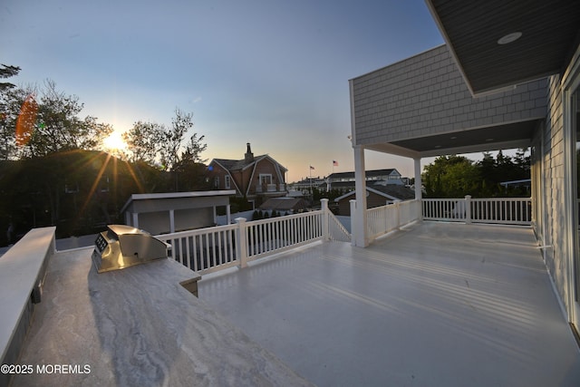 674 Lake Ave, Bay Head, NJ 08742 - patio terrace at dusk with exterior kitchen and an outdoor structure