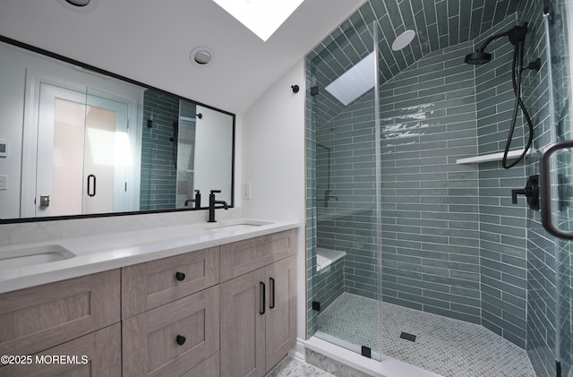 674 Lake Ave, Bay Head, NJ 08742 - full bathroom with double vanity, a stall shower, a skylight, and lofted ceiling