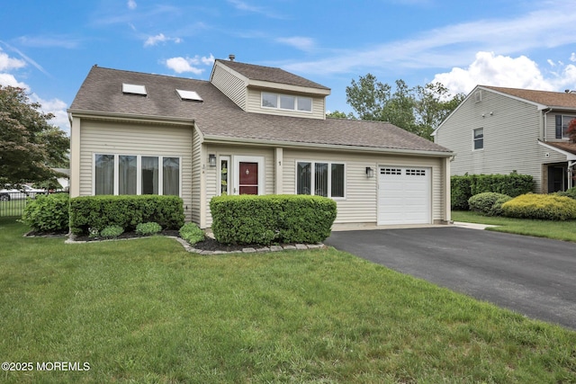 1 Independence Way, Howell, NJ 07731 - view of front of home featuring a garage, driveway, a front yard, and roof with shingles