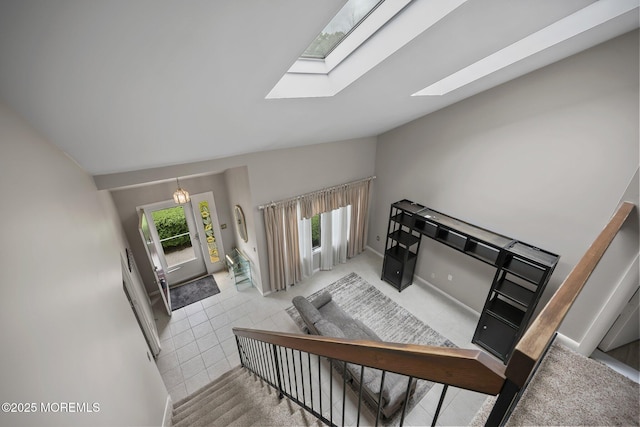 1 Independence Way, Howell, NJ 07731 - stairway with a skylight, baseboards, lofted ceiling, and carpet flooring