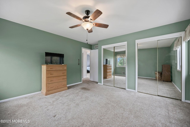 1 Independence Way, Howell, NJ 07731 - unfurnished bedroom with two closets, carpet floors, baseboards, and a ceiling fan