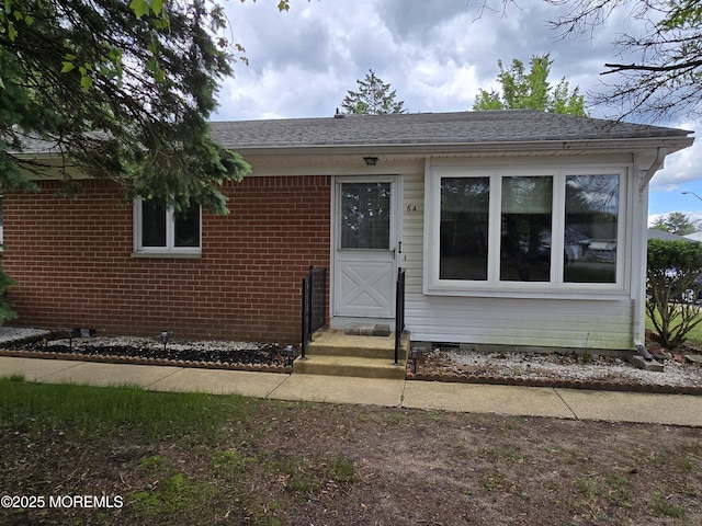 6 Conestoga Dr Unit A, Whiting, NJ 08759 - view of front of property with brick siding, crawl space, and a shingled roof