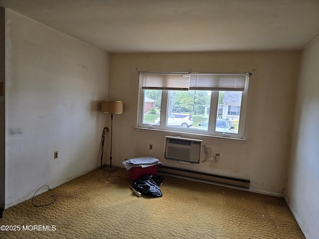 6 Conestoga Dr Unit A, Whiting, NJ 08759 - spare room featuring a baseboard radiator, carpet floors, and an AC wall unit