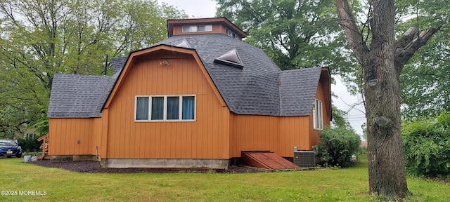 865 Windsor Perrineville Rd, East Windsor, NJ 08520 - view of property exterior featuring a shingled roof, a gambrel roof, a lawn, and central AC