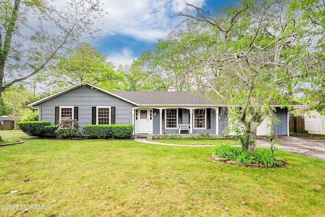 1015 Barnacle Dr, Manahawkin, NJ 08050 - ranch-style house with a front yard and a chimney