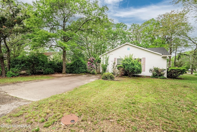 1015 Barnacle Dr, Manahawkin, NJ 08050 - view of green lawn with asphalt driveway