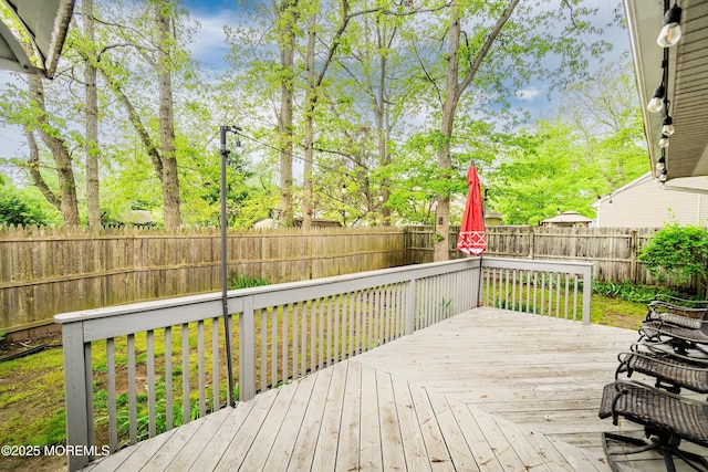 1015 Barnacle Dr, Manahawkin, NJ 08050 - wooden deck with a fenced backyard