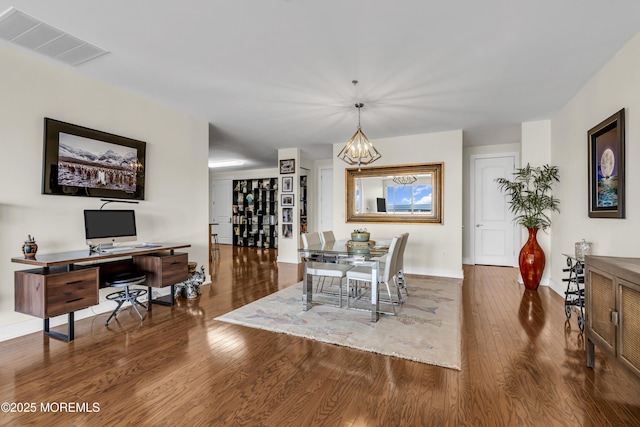 432 Ocean Blvd N Unit 506, Long Branch, NJ 07740 - dining space featuring a chandelier, wood finished floors, baseboards, and an office area